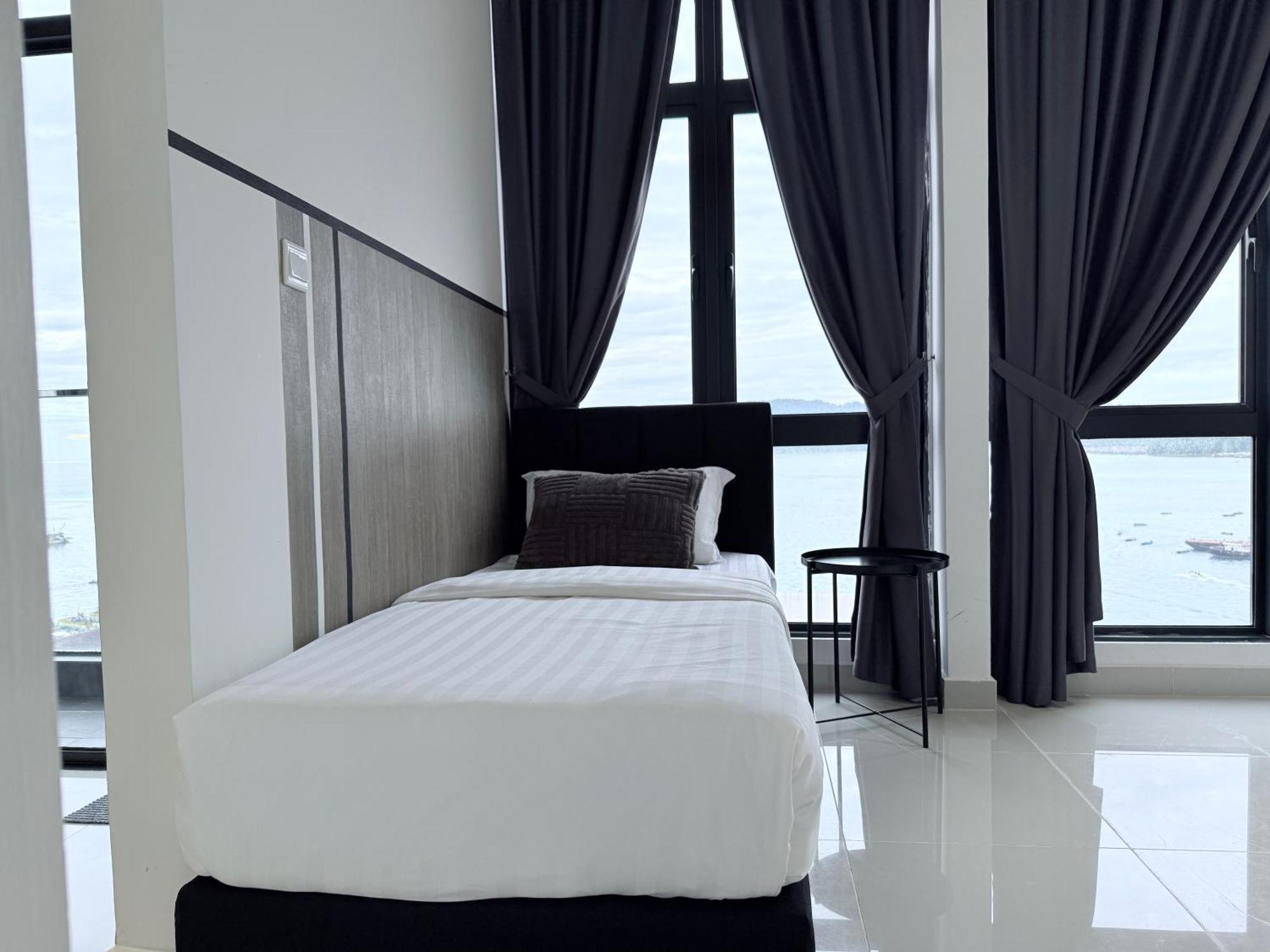 The Shore Cbd Kota Kinabalu By Laxzone Suite Luaran gambar